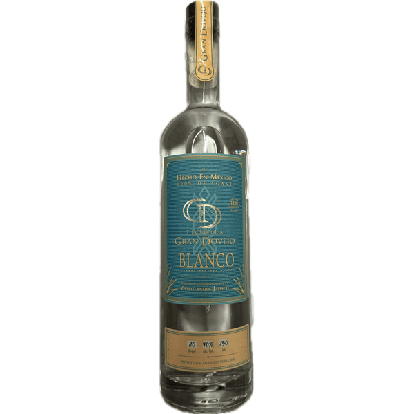 Bottle of Gran Dovejo Blanco with a blue label and gold accents.